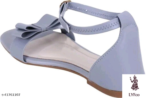 Catalog Name:*Voguish Women Flats*Material: SyntheticSole Material: RubberPattern: SolidFastening & Back Detail: Ankle LoopMultipack: 1 - IND-7