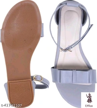 Catalog Name:*Voguish Women Flats*Material: SyntheticSole Material: RubberPattern: SolidFastening & Back Detail: Ankle LoopMultipack: 1 - IND-7