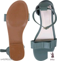 Catalog Name:*Voguish Women Flats*Material: SyntheticSole Material: RubberPattern: SolidFastening & Back Detail: Ankle LoopMultipack: 1 - IND-4