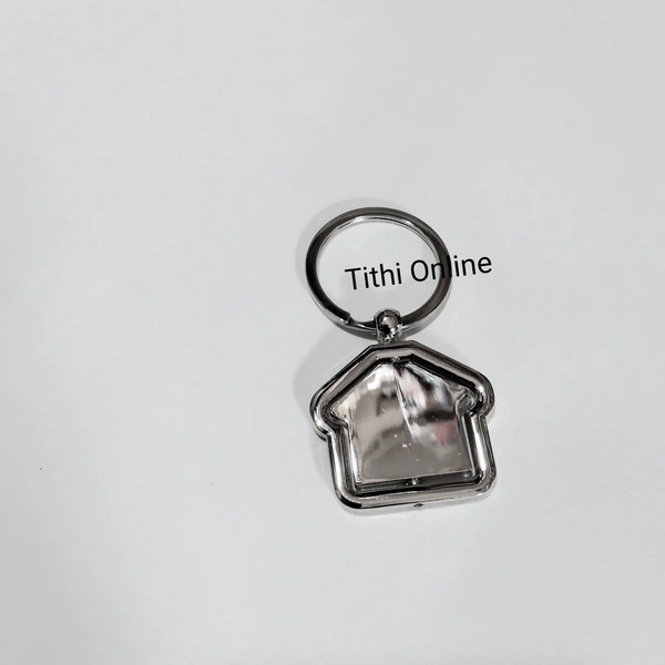 Rotating House Keychain  - Silver