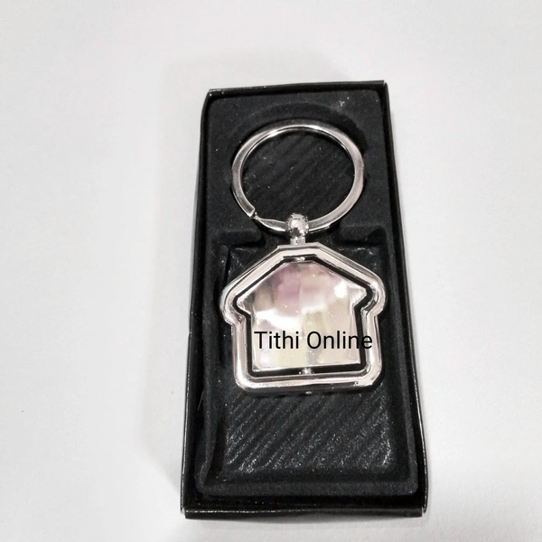 Rotating House Keychain  - Silver
